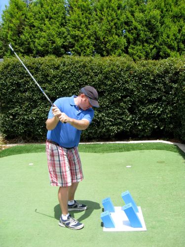 An ideal back swing is short and comfortable